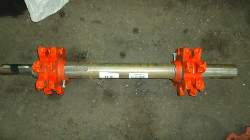 Вал в сборе 415.00.170 (натяжной с роликами) — 1